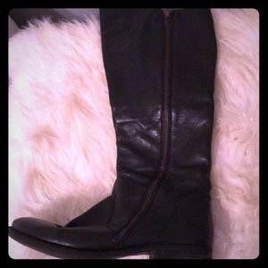 Black leather knee high boots